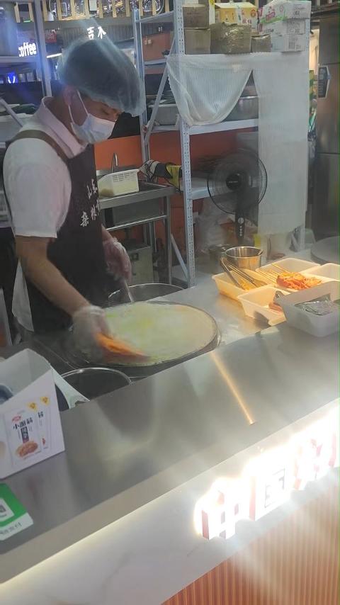 Eating a Shandong Pancake